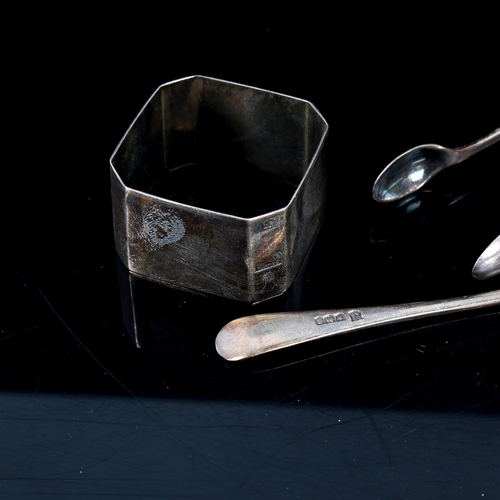 551 - A cased set of silver teaspoons and sugar tongs, and a silver napkin ring, 4oz total