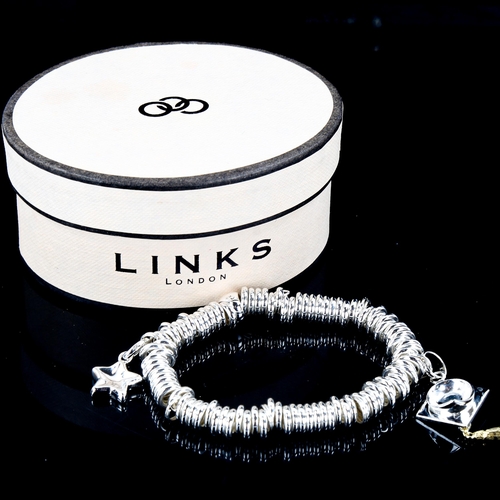 552 - LINKS OF LONDON - a modern sterling silver Sweetie charm bracelet, with 2 charms, bracelet length 17... 