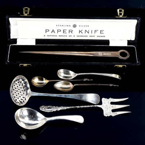 557 - Various silver, including Georgian meat skewer pattern paper knife, George III caddy spoon, bread fo... 