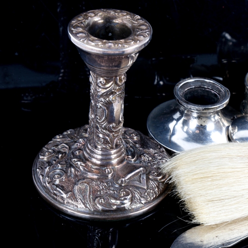 558 - Various silver, including candlestick, napkin rings, crumb brush etc