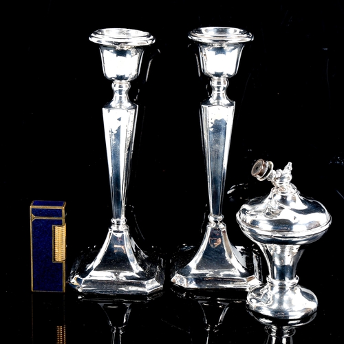 561 - A pair of silver table candlesticks, silver dressing table atomiser, and Dunhill Rollagas blue lacqu... 