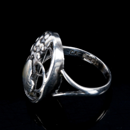 563 - 3 Vintage Danish stylised silver rings, largest setting height 25.6mm, sizes M, O and Q, 11.2g total... 