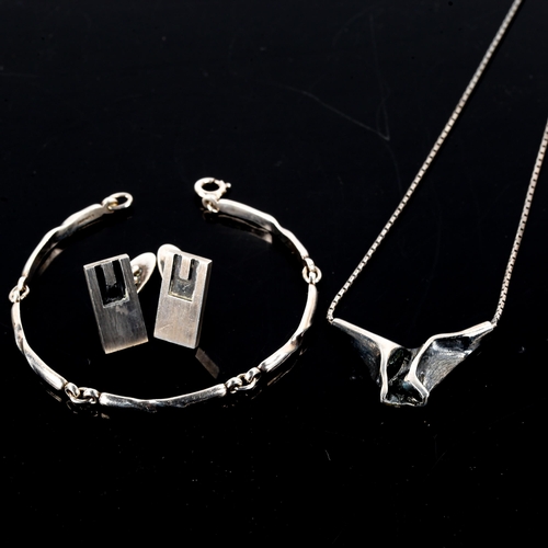 566 - NIELS ERIK FROM - a group of Danish modernist sterling silver jewellery, comprising fold pendant nec... 