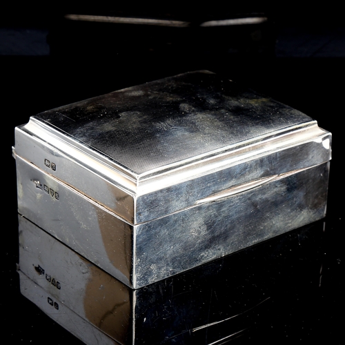 570 - A George VI rectangular silver cigarette box, engine turned lid with wood lining, by Walker & Hall, ... 