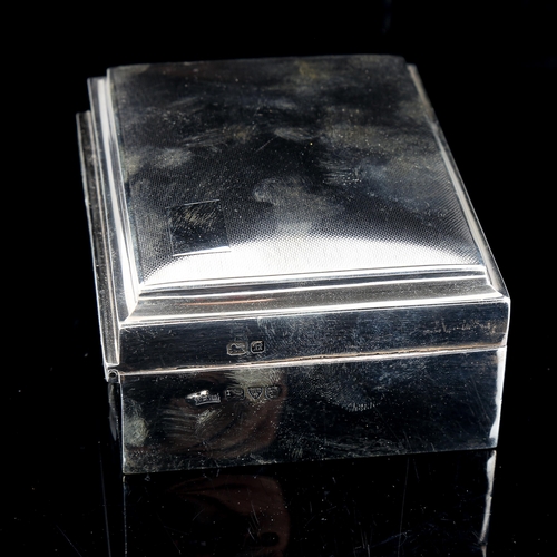 570 - A George VI rectangular silver cigarette box, engine turned lid with wood lining, by Walker & Hall, ... 