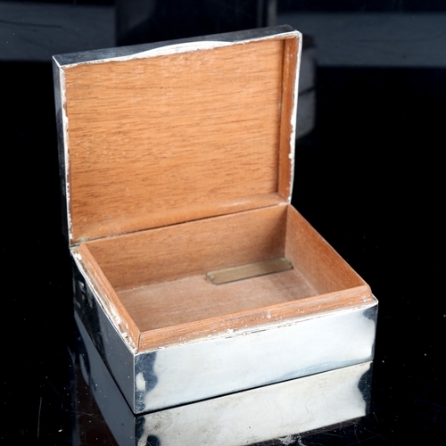 570 - A George VI rectangular silver cigarette box, engine turned lid with wood lining, by Walker & Hall, ... 