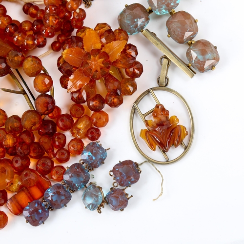 572 - Various amber beads, and a blue paste Riviere necklace, cross pendant and brooch set