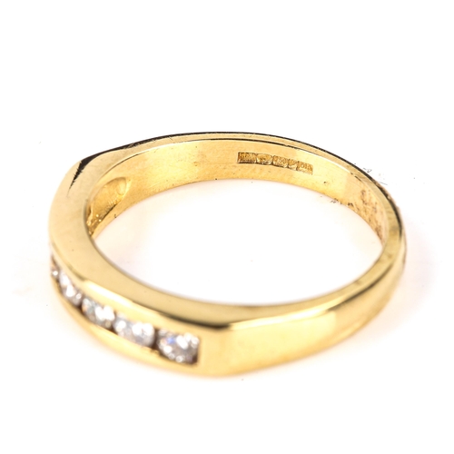 587 - A modern 18ct gold diamond half eternity ring, set with modern round brilliant-cut diamonds, total d... 