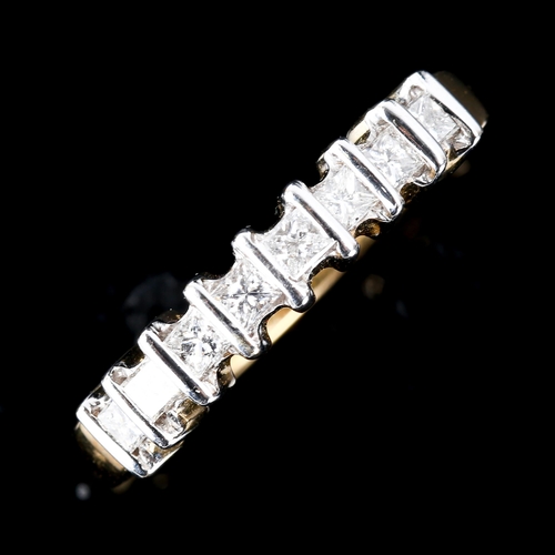 592 - A modern 18ct gold 8-stone diamond ring, set with Princess-cut diamonds, total diamond content appro... 