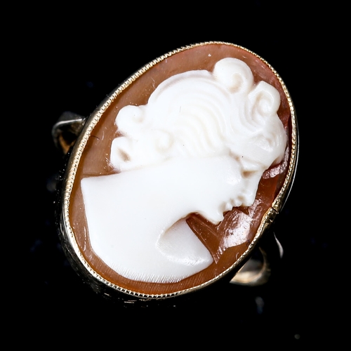 594 - A child's relief carved shell cameo ring, unmarked gold settings, setting height 16.4mm, size C, 2g