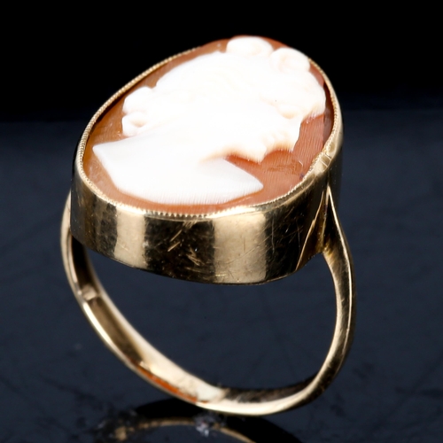 594 - A child's relief carved shell cameo ring, unmarked gold settings, setting height 16.4mm, size C, 2g