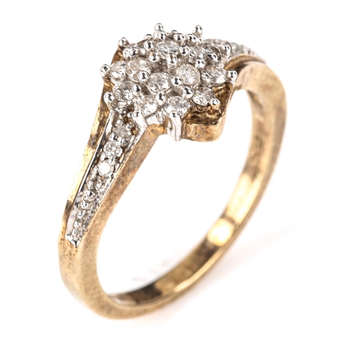 598 - A 9ct gold diamond cluster snowflake ring, set with modern round brilliant-cut diamonds, total diamo... 