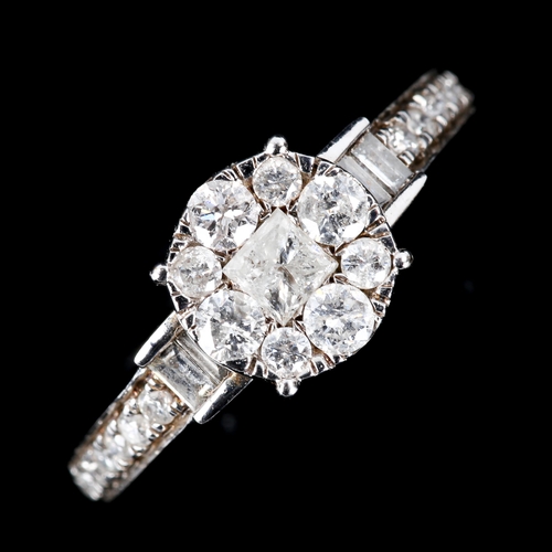 599 - An 18ct white gold diamond cluster ring, set with Princess, modern round brilliant and baguette-cut ... 