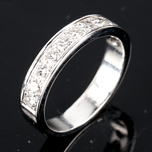 600 - An 18ct white gold diamond half eternity ring, set with modern round brilliant-cut diamonds, total d... 