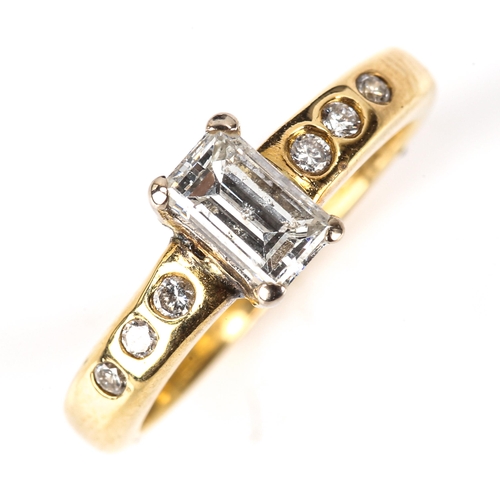 602 - An 18ct gold solitaire diamond ring, set with rectangular step-cut diamond and modern round brillian... 