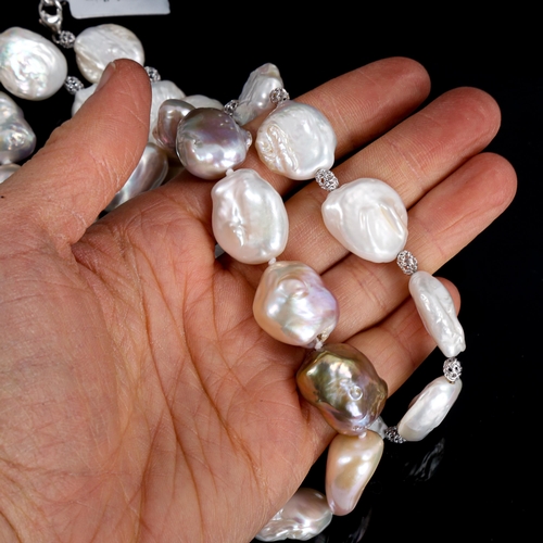 607 - 2 large Baroque freshwater pearl necklaces, both 40cm long (2)