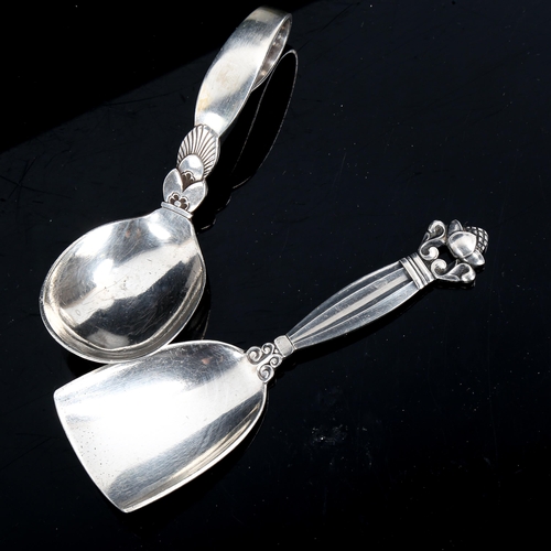 610 - GEORG JENSEN - a Danish sterling silver Kongens pattern tea caddy spoon, and a Cactus pattern baby s... 