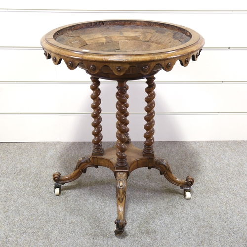 1151 - A 19th century circular walnut table base, with shaped frieze, barley twist supports and carved base... 