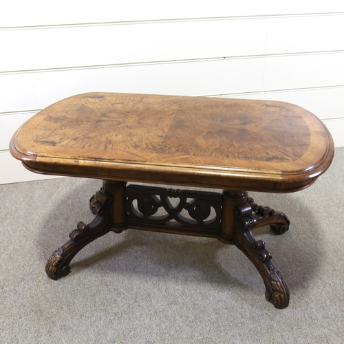 1153 - *WITHDRAWN* A Victorian burr-walnut low table, on elaborate carved and pierced stretcher base, 110cm... 