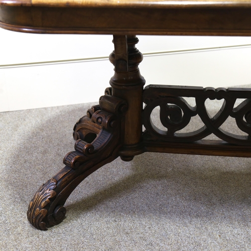 1153 - *WITHDRAWN* A Victorian burr-walnut low table, on elaborate carved and pierced stretcher base, 110cm... 