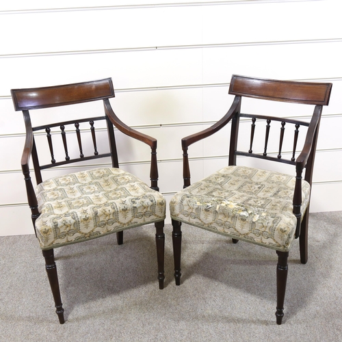 1157 - A pair of Georgian mahogany elbow chairs