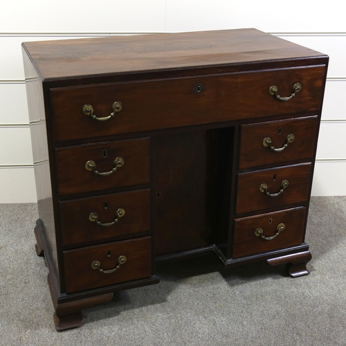 1209 - A Georgian mahogany kneehole desk with alcove cupboard, 92cm x 50cm