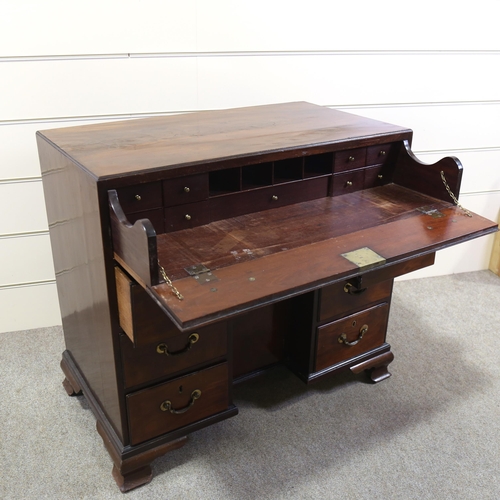 1209 - A Georgian mahogany kneehole desk with alcove cupboard, 92cm x 50cm