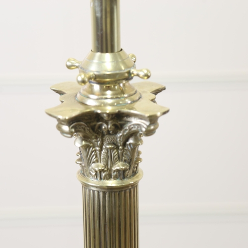 1212 - A Victorian brass Corinthian column telescopic standard lamp, converted to electric