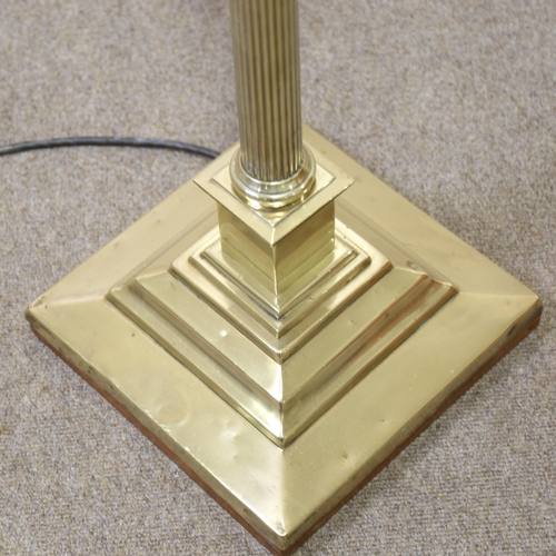 1212 - A Victorian brass Corinthian column telescopic standard lamp, converted to electric