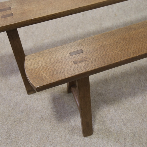 1220 - A pair of 19th century oak trestle benches, length 203cm