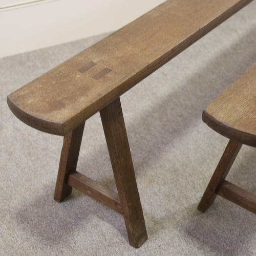 1220 - A pair of 19th century oak trestle benches, length 203cm