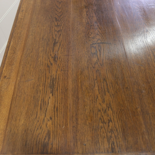 1260 - A 19th century oak library table, with single frieze drawer and stretcher base, 130cm x 79cm