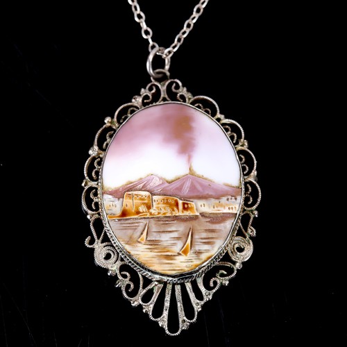 380 - A Vintage Italian relief carved shell cameo pendant necklace, depicting Vesuvius erupting, in an unm... 