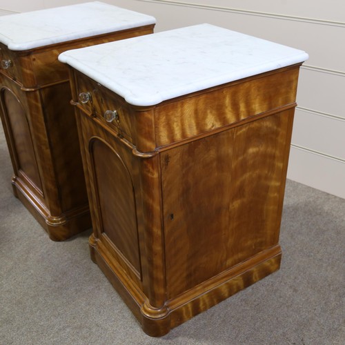 1266 - A pair of 19th century satinwood pedestal cupboards, with shaped white marble tops, single frieze dr... 