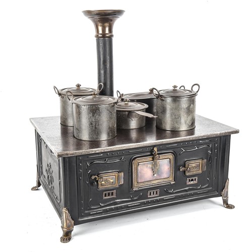 1261 - A Marklin tinplate stove and accessories, width 37cm