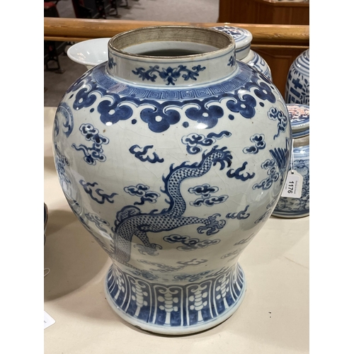 1202 - A large Chinese blue and white porcelain jar and cover, decorated with dragons and exotic birds, 6 c... 