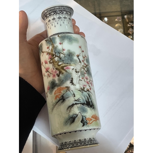 1203 - A pair of Chinese white glaze porcelain sleeve vases, with painted exotic birds and text, seal marks... 