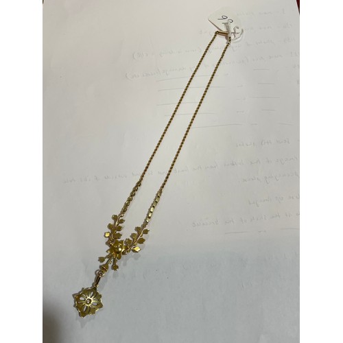 66 - An Edwardian 15ct gold pearl and diamond necklace, floral design set with split pearls and diamond s... 