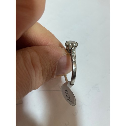 124 - An Antique platinum 0.6ct solitaire diamond ring, claw set with round brilliant diamond and single-c... 