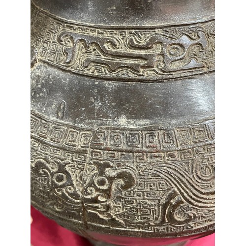 1206 - A large Chinese patinated bronze vase, with relief moulded friezes, height 46cm, rim diameter 22cm