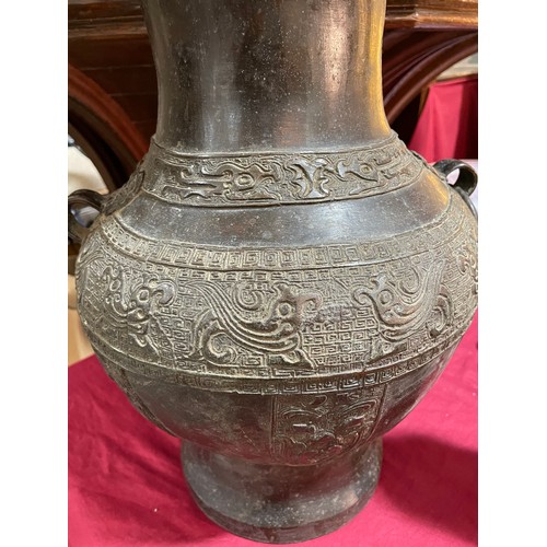 1206 - A large Chinese patinated bronze vase, with relief moulded friezes, height 46cm, rim diameter 22cm