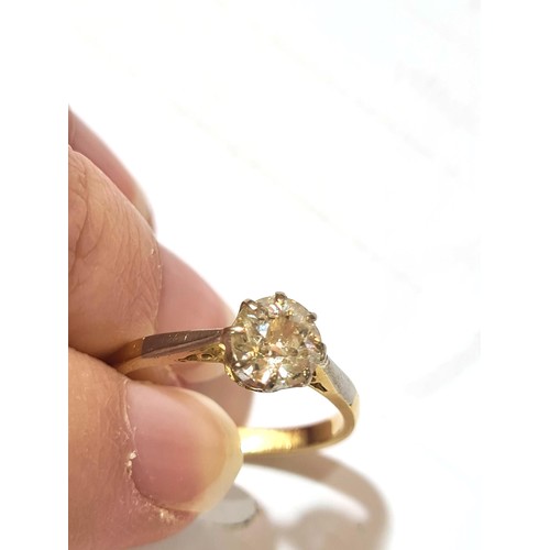 68 - An early/mid-20th century 18ct gold 0.75ct solitaire diamond ring, plain 8-claw setting with old Eur... 