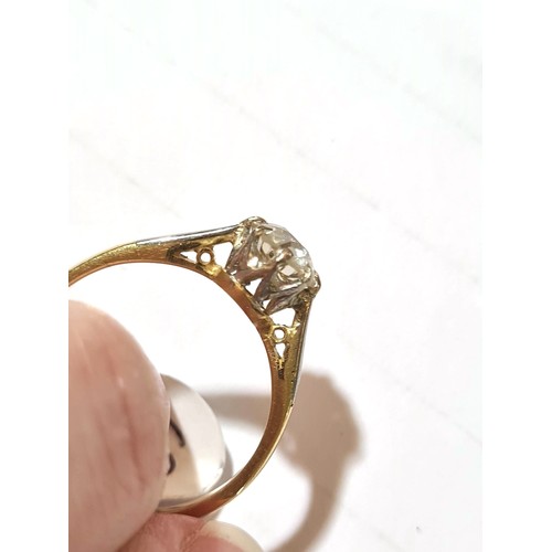 68 - An early/mid-20th century 18ct gold 0.75ct solitaire diamond ring, plain 8-claw setting with old Eur... 