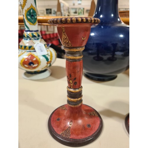 1127 - A pair of Turkish Tophane red and gilt pottery candlesticks, height 18cm