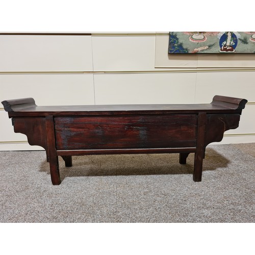 1016 - A Chinese stained wood altar table of small size, with 4 small carved drawers and central cupboard f... 