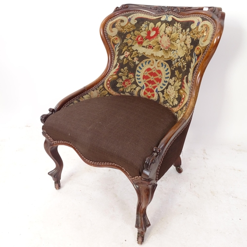 2127 - A Victorian rosewood bow-back nursing chair, with needlework upholstery, on cabriole legs