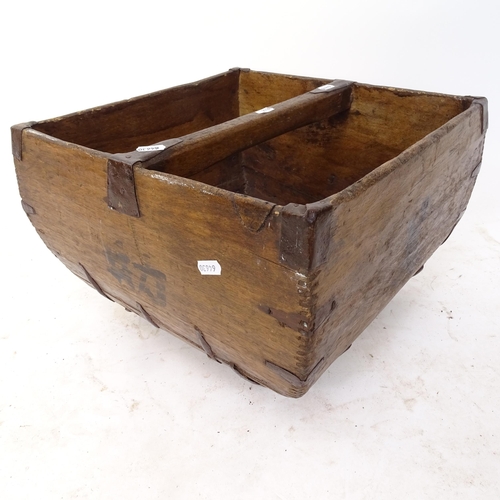 2128 - An Antique Chinese elm and steel-bound basket, W38cm, H27cm