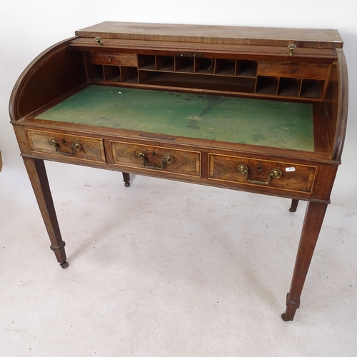 2137 - A Regency crossbanded mahogany and satinwood-strung writing desk, with tambour front, fitted interio... 