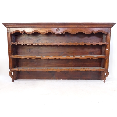 2142 - An 18th century Continental fruitwood plate rack, L199cm, H108cm