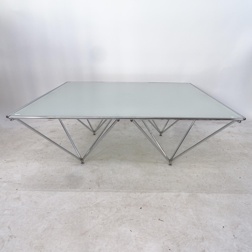 2144 - A designer geometric coffee table, with chrome skeleton base and frosted glass top, in the manner of... 